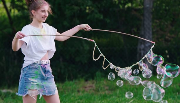 Girl Blows Large Soap Bubbles, Outdoor Fun