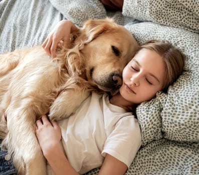 Cute Little Girl Sleeping With Dog In Embrace In Bed