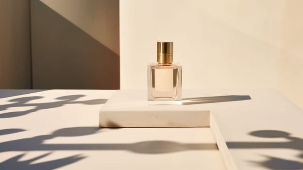 Transparent brown glass perfume bottle mockup on pedestal with minimalist background. Eau de toilette. Mockup, spring flat lay