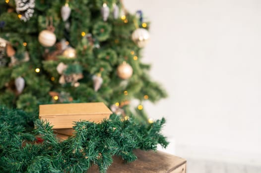 Book with copy space at the chtistmas tree