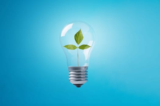 Light bulb with green leaves on blue background. Sustainable energy, Save the Planet, Earth hour concept