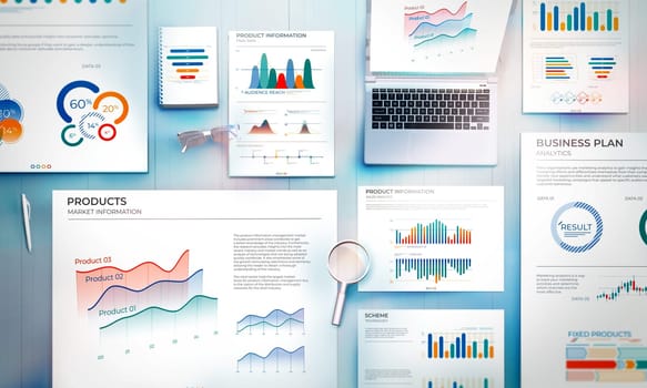 Top view of a set of documents with business infographics on an office desk.