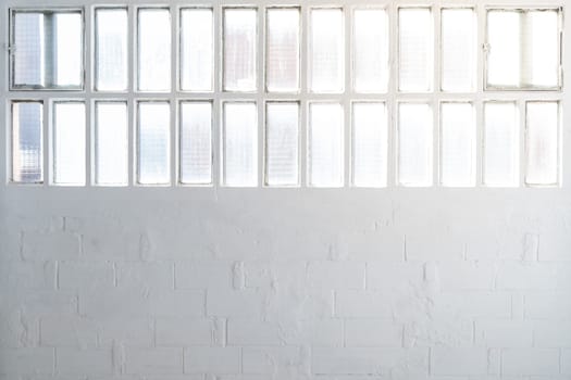 Empty industrial window space with white walls background with copy space for text. High quality photo