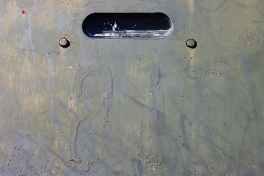 Old rusty metal door of an old car, closeup of photo