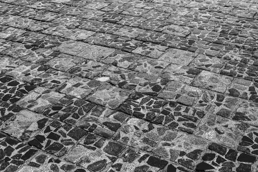 Old cobblestone street, cobblestone, tiled floor, pavement ground texture.. old tiles.