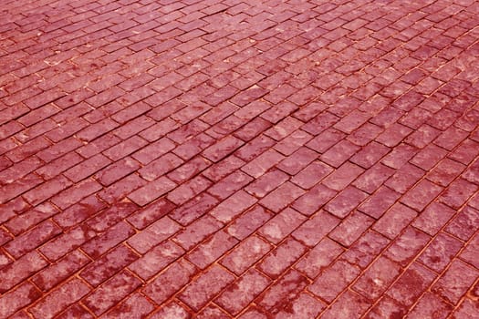 Decorative, red, paving stones close-up.