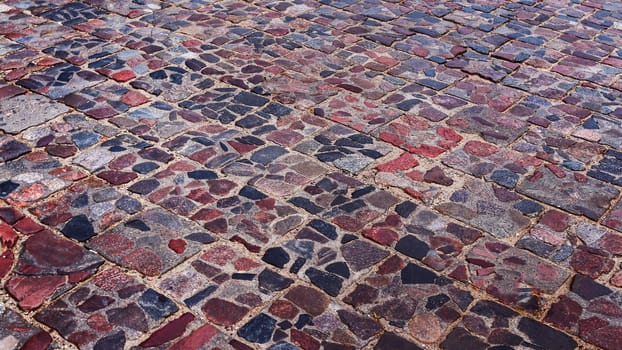 Old cobblestone street, cobblestones, tiled floor, pavement texture.