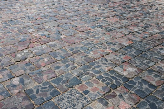 Old cobblestone street, cobblestones, tiled floor, pavement texture.