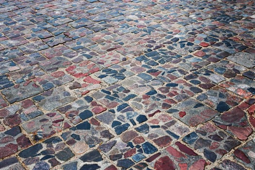 Old cobblestone street, cobblestones, tiled floor, pavement texture.