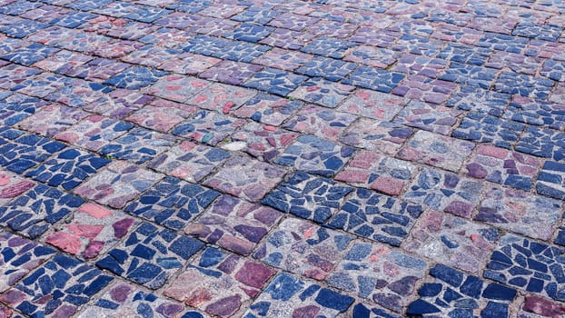 Old cobblestone street, cobblestones, tiled floor, pavement texture.