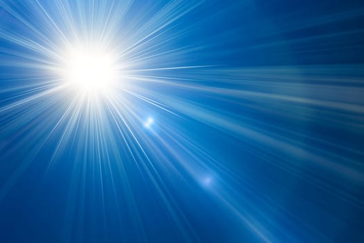 A brilliant sunburst with rays of light and flare, illuminating the sky with dazzling brightness
