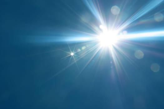 Sun sky blue light flare lens sunlight beam radiance glow bright sparkle shine