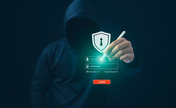 Hacker pointing pen at login screen On a dark background. Concept of information security in internet networks and espionage. Network espionage. Virus attack. Hacker attack.