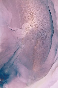 A close-up image of abstract ink swirls in shades of lavender and teal, creating a mesmerizing and artistic effect.