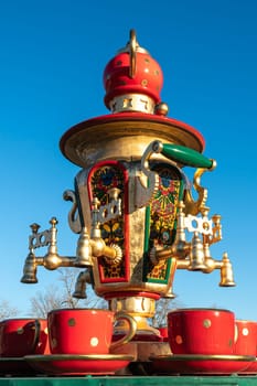 This image showcases a traditional Russian samovar, a decorative and functional piece of cookware used for brewing tea.