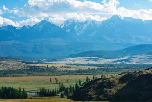 Kurai steppe and North-Chui ridge on background. Altai mountains, Russia.
