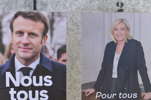 PARIS, FRANCE - APRIL 20, 2022 : The banners with candidates for President elections
