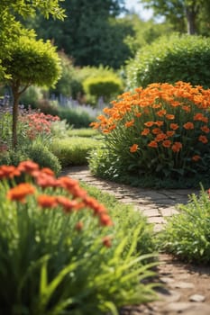 A stone path winds its way through a beautifully landscaped garden, where vibrant orange flowers bloom in abundance. The lush greenery of the surrounding plants and trees creates a tranquil and inviting atmosphere. The sunlight filters through the foliage, casting a warm glow on the scene.