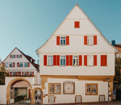 Old national German town house. Old Town is full of colorful and well preserved buildings. Baden-Wurttemberg is a state in southwest Germany bordering France and Switzerland. The Black Forest, known for its evergreen scenery and traditional villages, lies in the mountainous southwest. Stuttgart, the capital, is home to Wilhelma, a royal estate turned zoo and gardens. Porsche and Mercedes-Benz have headquarters and museums there. The 19th-century Hohenzollern Castle sits in the Swabian Alps to the south.