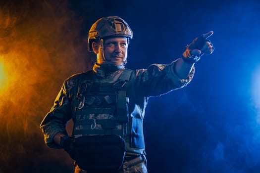 A portrait showcases a soldier in tactical gear against a backdrop of intense orange and blue smoke effects