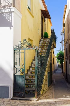 Tiled stairs Anacapri house with painted flowers decoration in Capri Island, Italy.