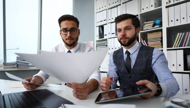 Group of people hold in arms financial papers solve and discuss problem portrait. Fresh view review situation new angle look professional training white collar investment and finance concept