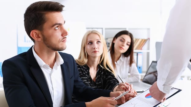 Beautiful smiling woman portrait with group of people listen carefully during seminar. Study event client conversation job customer support service case hear in court leader performance concept