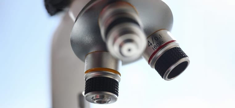 The head microscope on the background laboratory is a study human biology analyzes for non-compliance with the requirements organization public health at international level