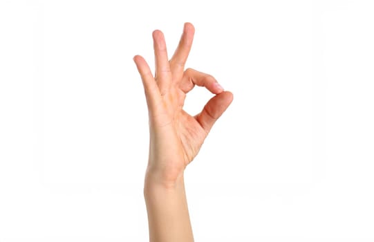 Male arm showing OK or confirm sign with thumb up closeup isolated on white background. High level and quality adviser offer and happy client