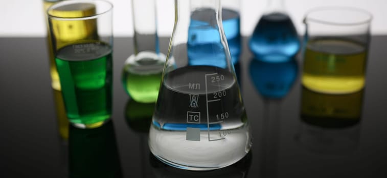 Chemical industry bulb with blue magenta test tube background