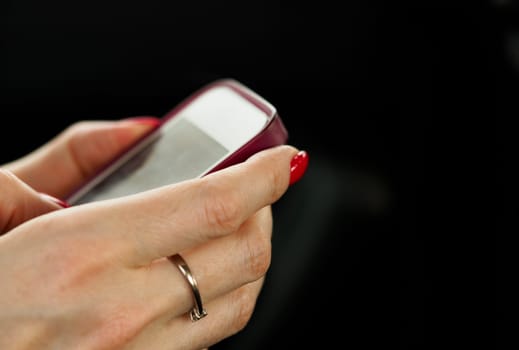 Businesswoman arm hold and use cellphone closeup. 24-7 telephone call service operator smart people time management modern chat job share blog tweet mania news web app