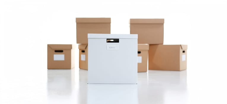 A lot of carton box of kraft color. Theme of moving the loading of unloading cargo delivery of goods from the Internet to the purchaser from the supplier