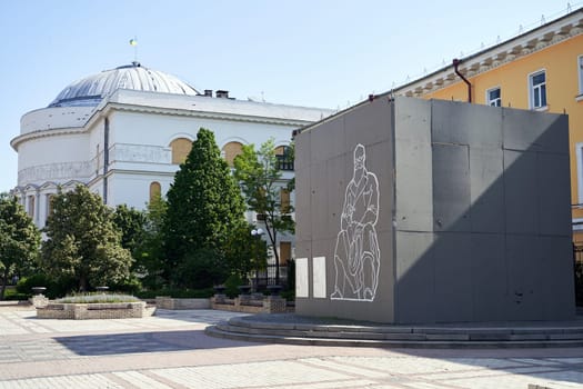 Kyiv, Ukraine - May 20, 2023: Monument to Mykhailo Hrushevsky Ukrainian academician, politician, historian and statesman protected from possible destruction during the Russian invasion of Ukraine