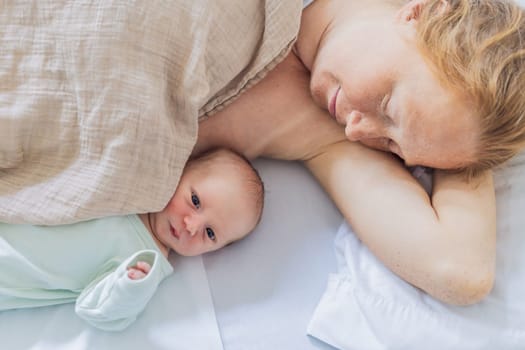 A baby lies with the mother after childbirth, resting peacefully. The serene moment captures the bond between mother and child as they begin their journey together. The hospital environment ensures a safe and comforting space for this intimate interaction.