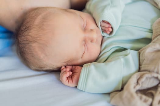 A baby lies with the mother after childbirth, resting peacefully. The serene moment captures the bond between mother and child as they begin their journey together. The hospital environment ensures a safe and comforting space for this intimate interaction.