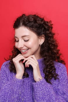 portrait of a girl with braces close-up, woman is happy with braces, beautiful teeth concept