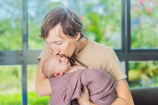 Dad and newborn at home. This tender moment captures the bond between father and child in a loving and comfortable family environment highlighting the joys of parenthood and the warmth of home.