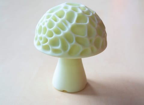 Object in the form of mushroom of white color printed on a 3D printer. Three-dimensional model printed on a 3D printer from molten plastic of red color. Concept 3D Printing. FDM 3D Printing technology