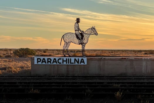 Parachilna sculpture at sunset, capturing the essence of Ikara Flinders Ranges' outback charm.
