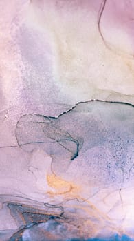 A close-up abstract image of purple, gold, and white ink swirls, creating a mesmerizing and artistic composition.