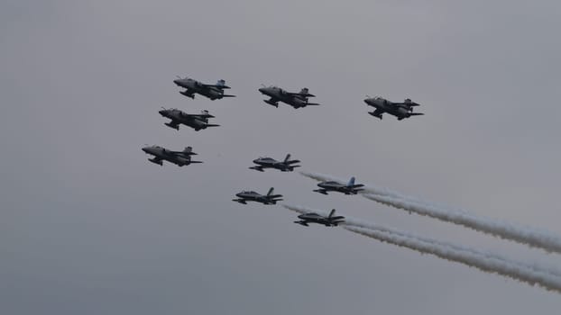 Istrana Italy April 5 2024: Fighter Jet Airplanes Formation During a Military Parade. AMX Ghibli of Italian Air Force. NATO Power and Strength. Copy Space
