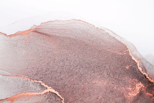 A close-up abstract image of a watercolor painting featuring a blend of rose gold and grey hues creating a captivating and artistic visual.