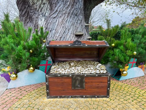A treasure chest filled with Christmas decorations. photo