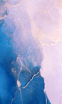 A close-up image of teal and white ink swirling together, creating a beautiful abstract pattern.