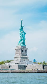 The Statue of Liberty, New York City on sunny blue sky. American symbol. Memorial day, Patriot Day. Space for text. New York NY USA 2023-07-30.