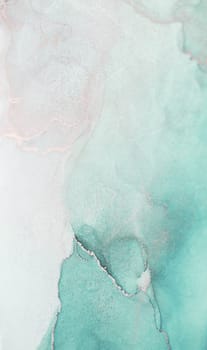 A close-up shot of an abstract watercolor painting featuring a blend of cool mint green and white hues. The colors swirl and flow, creating a dynamic and artistic composition.