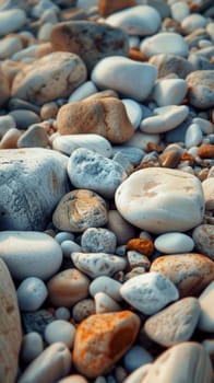 The warm glow of the setting sun highlights a mosaic of pebbles on the beach, showcasing nature's intricate textures and patterns. It's a portrait of tranquil beauty