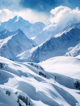 Unspoiled snow drifts sweep across the alpine landscape, leading to rugged mountain peaks that reach into a bright cloud-filled sky, showcasing nature's pristine elegance