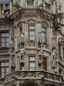 Munich, Germany - Dec 21, 2023 - Exterior architecture design details of famous New Town Hall (Neue Rathaus) on Marienplatz square in Munich. Gothic architectural style. Copy space, Selective focus.