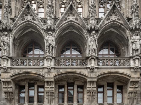 Munich, Germany - Dec 21, 2023 - Exterior architecture design details of famous New Town Hall (Neue Rathaus) on Marienplatz square in Munich. Gothic architectural style. Copy space, Selective focus.